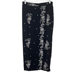 Black and white floral midi skirt with floral design no size tag with slit